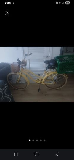 Yellow Cruiser Bicycle with Front Basket and Rear Crate