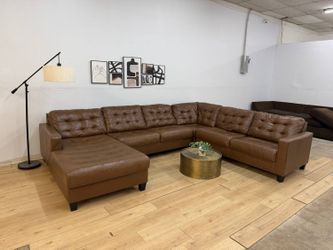 Genuine Leather 4-Piece Sectional Couch by Ashley