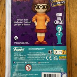 Funko Scooby-Doo! Blockbuster Rewind Velma vinyl figure.