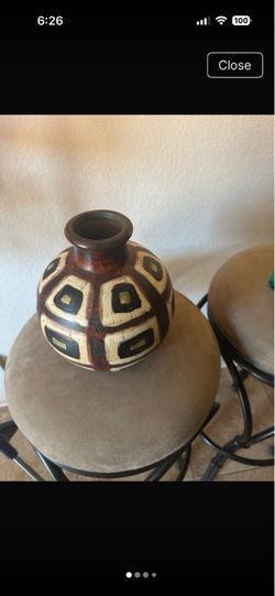 Decorative Geometric Ceramic Vase - Cream, Black & Brown Stylish ceramic vase featuring a cream base $30.00
