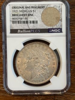 1921 Morgan Dollar NGC Brilliant UNC w/ Original Bag Fragment