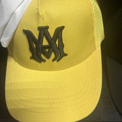 Amiri yellow and black cap