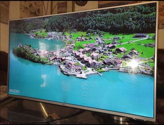 50" LG not smart but come with fire stick Amazon u got all apps u need already set.  Great Quality Pic No Scratch