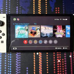 Nintendo Switch OLED W/ extras
