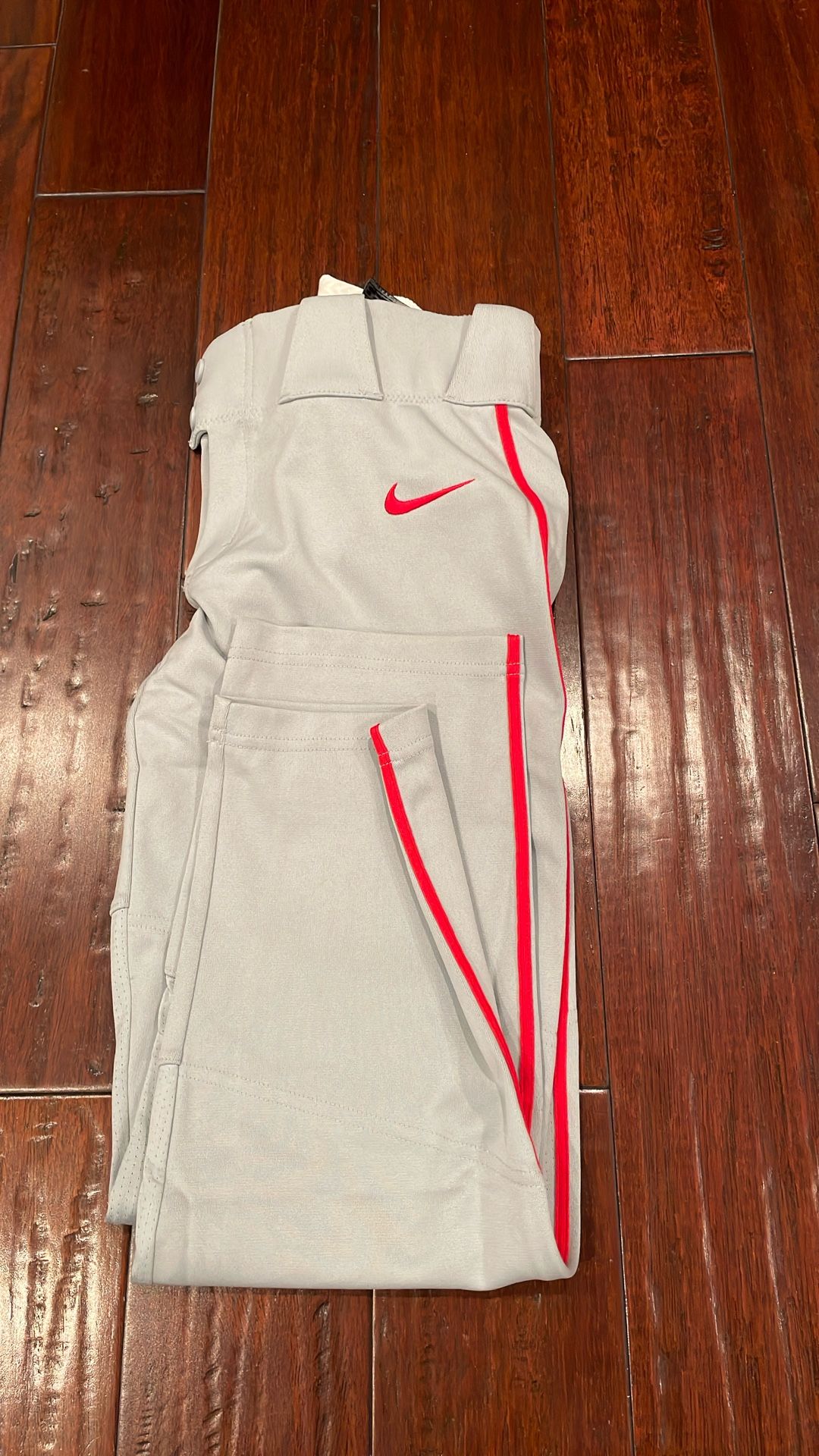 New Nike vapor gray with red side piping youth large baseball pants