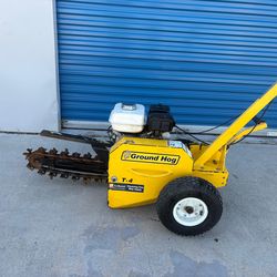 Ground Hog Trencher  18 inches n new chain very good condition $1999