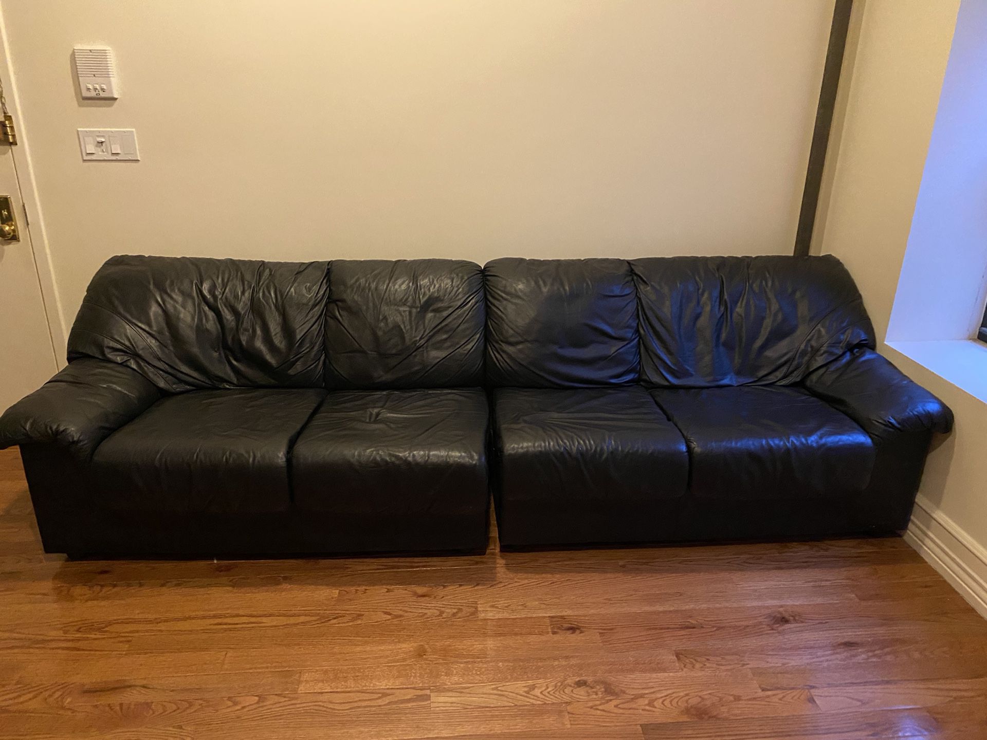 Perfect condition 2 piece black leather couch