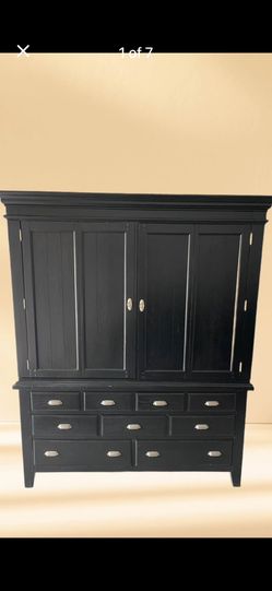 American signature Plantation Cove black armoire/entertainment center