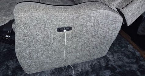 Grey reclining loveseat