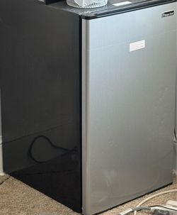 Small refrigerator barely used