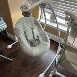 baby crib and swing