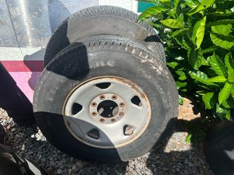 (2) LT245/75R17 wheels and tires
