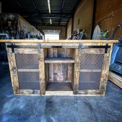 Custom made tv stand and entry table in rustic industrial style.