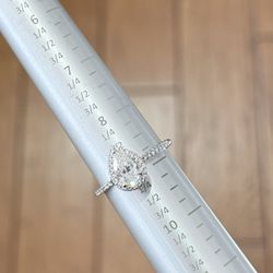 Pear cut Diamond halo wedding ring 