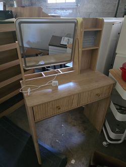 Small vanity with halo lighting