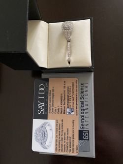 Size 7 14 karat white gold diamond ring set
