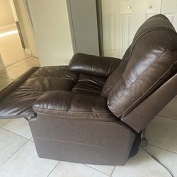 NEW leather electric recliner arm chair . Out the box
