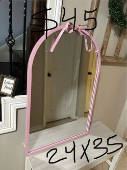 Wall pink mirror