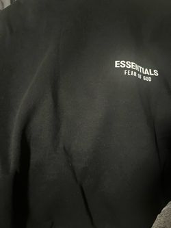 Black hoodie with white letters 80% cotton 20% polyester.
