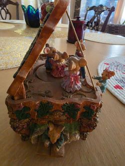 multi-action musical display featuring several mice dressed in miniature clothing.