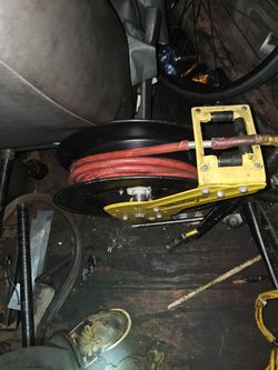 Central air hose and reel within drill0