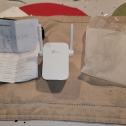 For Sale This PT- Link AC1200 Model RE305, Wi-Fi Range Exterder