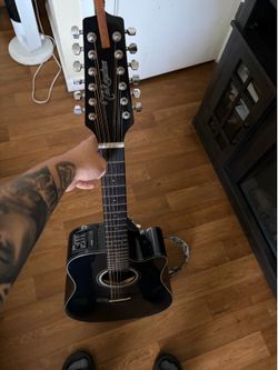 Black Takamine 12 string requinto