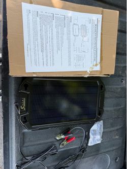 Solar panel battery charger, $40 DELIVERY AVAILABLE