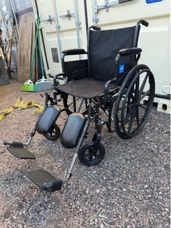 Medline K1 Basic Vinyl Wheelchair, 20" Wide Seat, Swing-Back Desk-Length Arms, Elevating Leg Rests - Comfortable, Durable & Reliable Mobility Aid