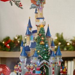 CHRISTMAS DISNEY MUSICAL CASTLE. NEW, WITH ALL THE CAST MEMBERS CIRCLING THE CASTLE. 