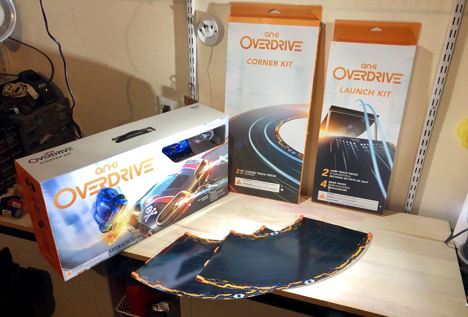 Anki Overdrive Kit with Extra Launch Kit, and two sets of Corner Kit