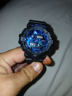 G shock watch and  and soccer ball necklace
