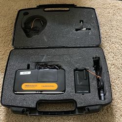 Audio-Technica  ATW-R200 wireless system, specifically a body-pack transmitter and a lavalier microphone in a carrying case. Key specifications and fe