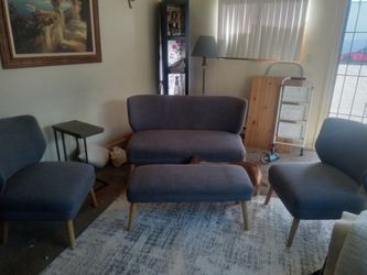 Nice clean chair and love seat with footstools