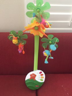 Musical moving baby mobile
