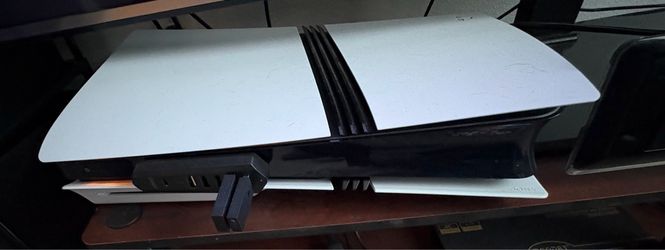 PS5 PRO W/ 4 TB STORAGE, DISC DRIVE, PULSE HEADSET, DUALSENSE, CHARGING STATION AND TWO GAMES!!