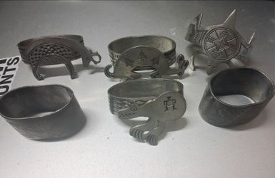 Silver (chrome?) napkin rings