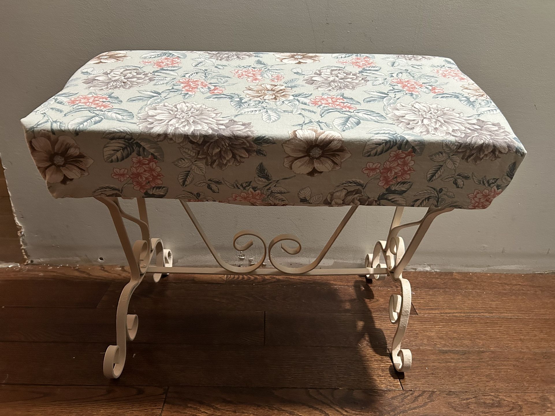 Wrought Iron Stool/Bench with a floral New upholstered top.