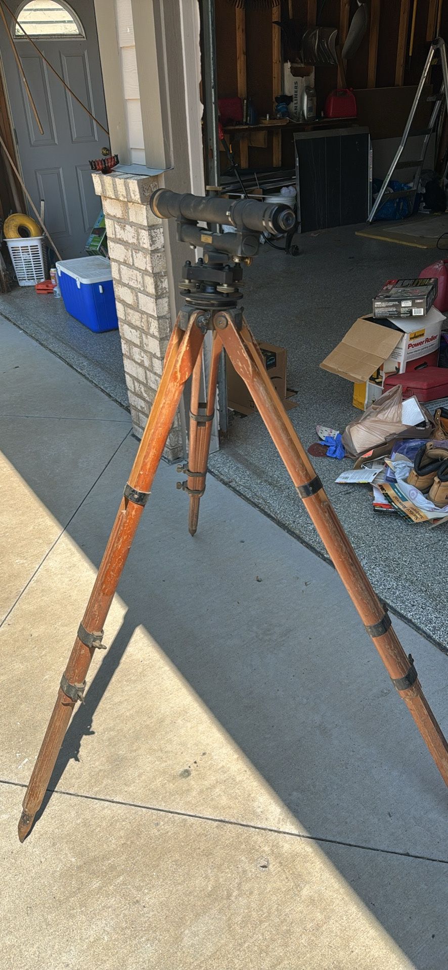Antique Keuffel & Esser co. surveying transit level equipment with tripod