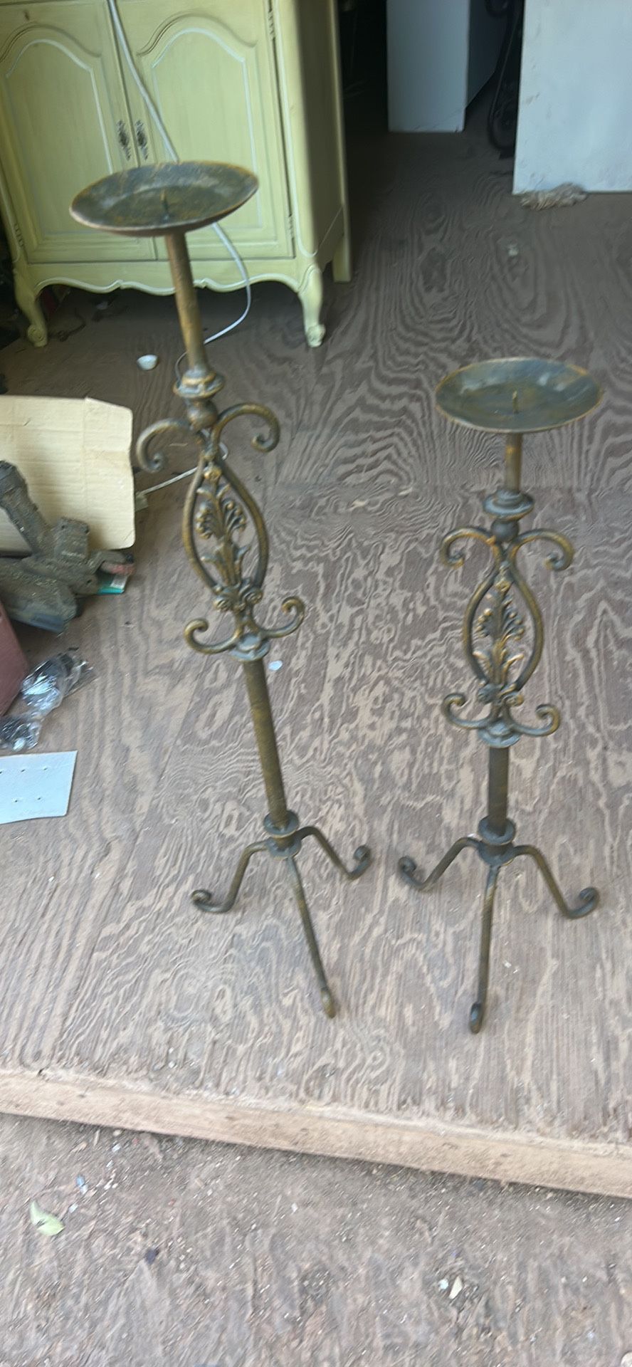 Two candlelabras the tallest one is 31 inches tall