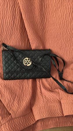 Black Qulit clutch or crossbody, $11