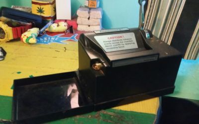 Cigarette roller machine