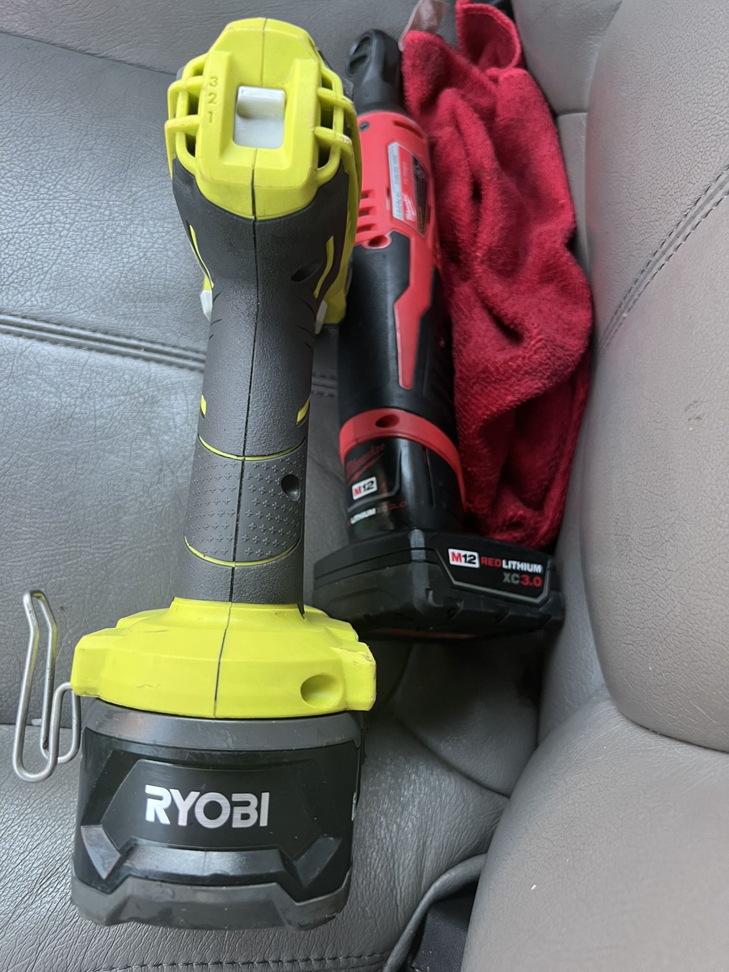 Only Ryobi comes with its battery and charger. S