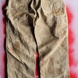 Carhartt Original Dungaree Fit B11-BRN Brown Duck Canvas Carpenter Jeans
Loose Fit
 30”x32”
Very nice camouflage light brown duck 
Excellent condition