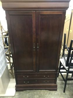 Solid wood armoire / entertainment center
