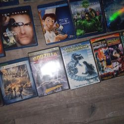 Movies $1 Each.     Cualquiera A Dollar