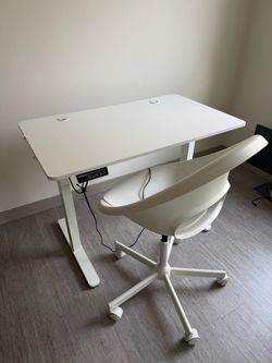 White standing desk and chair