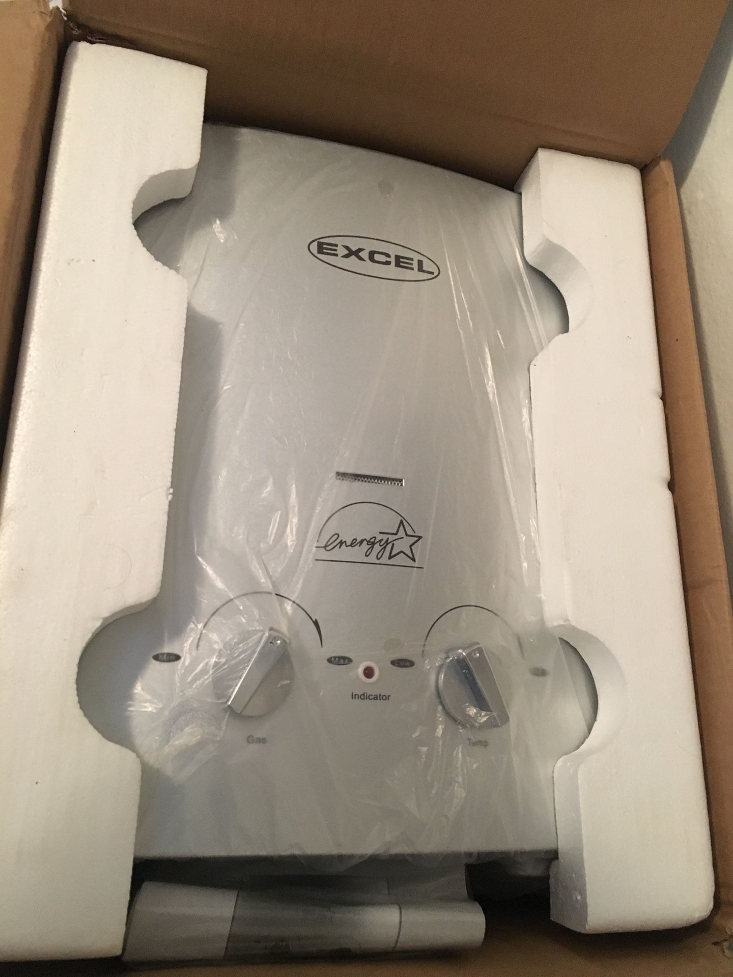 Excel tankless water heater (gas)