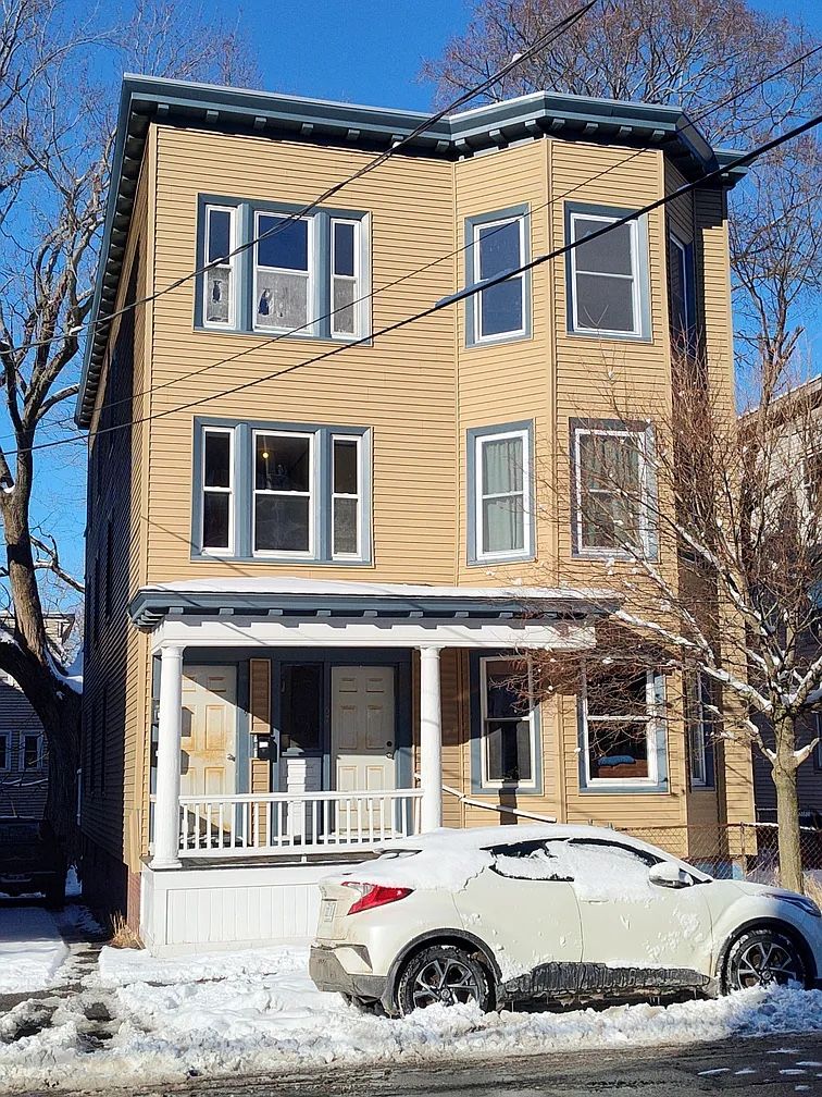 Very clean In-Town bright and sunny 3rd floor unit. This 4 bedroom unit is freshly painted, refinished hard floors throughout, new dark laminate kitch