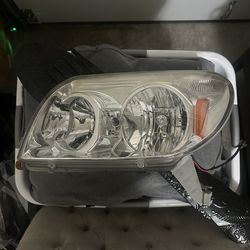 2003–2005 Toyota 4Runner OEM Headlights (Pair) – Clean Lenses